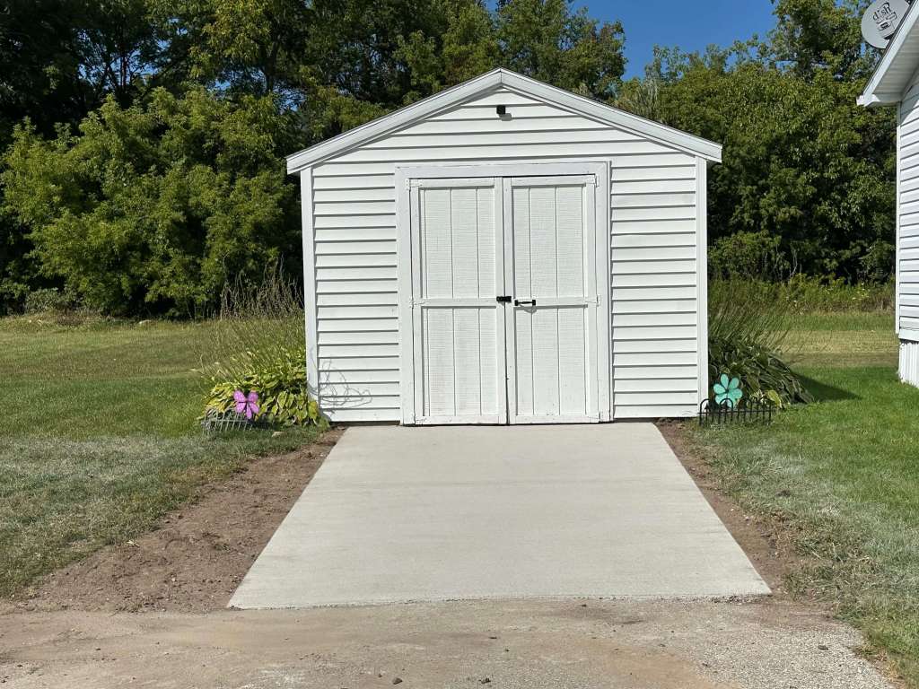 Concrete Pad in Front of Shed